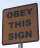 ``Bitte dieses Schild beachten!''